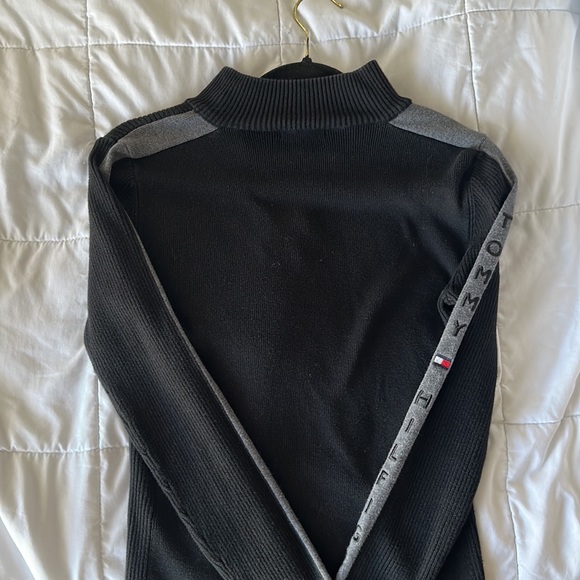 It is brand new small,neck zip up, sweater by Tommy Hilfiger.The color is black. - Picture 3 of 5